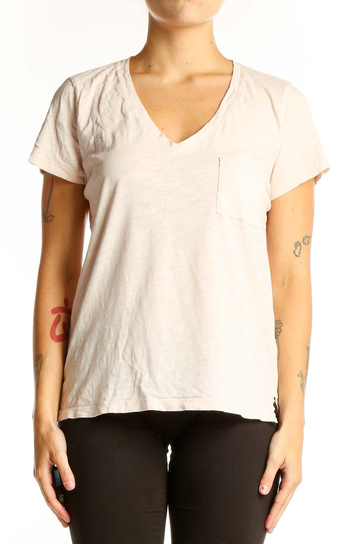 Front view of Madewell blush V-neck cotton tee with chest pocket
