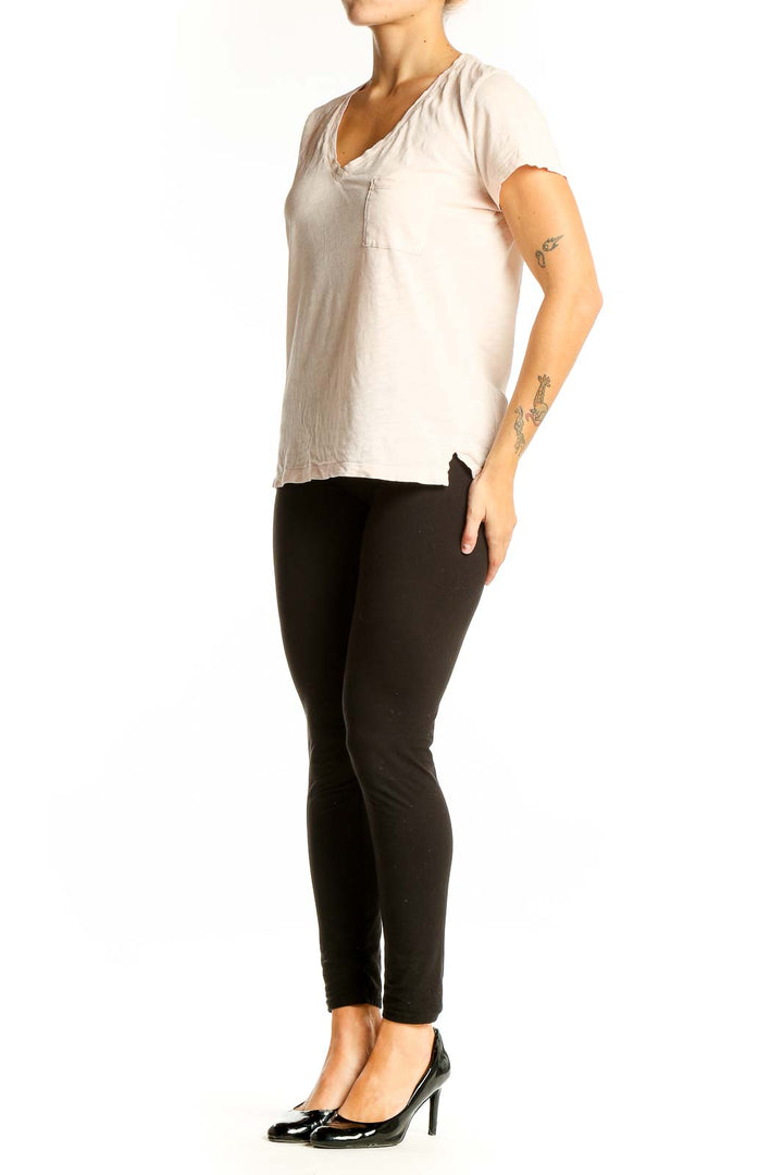 Front view of Madewell blush V-neck cotton tee with chest pocket