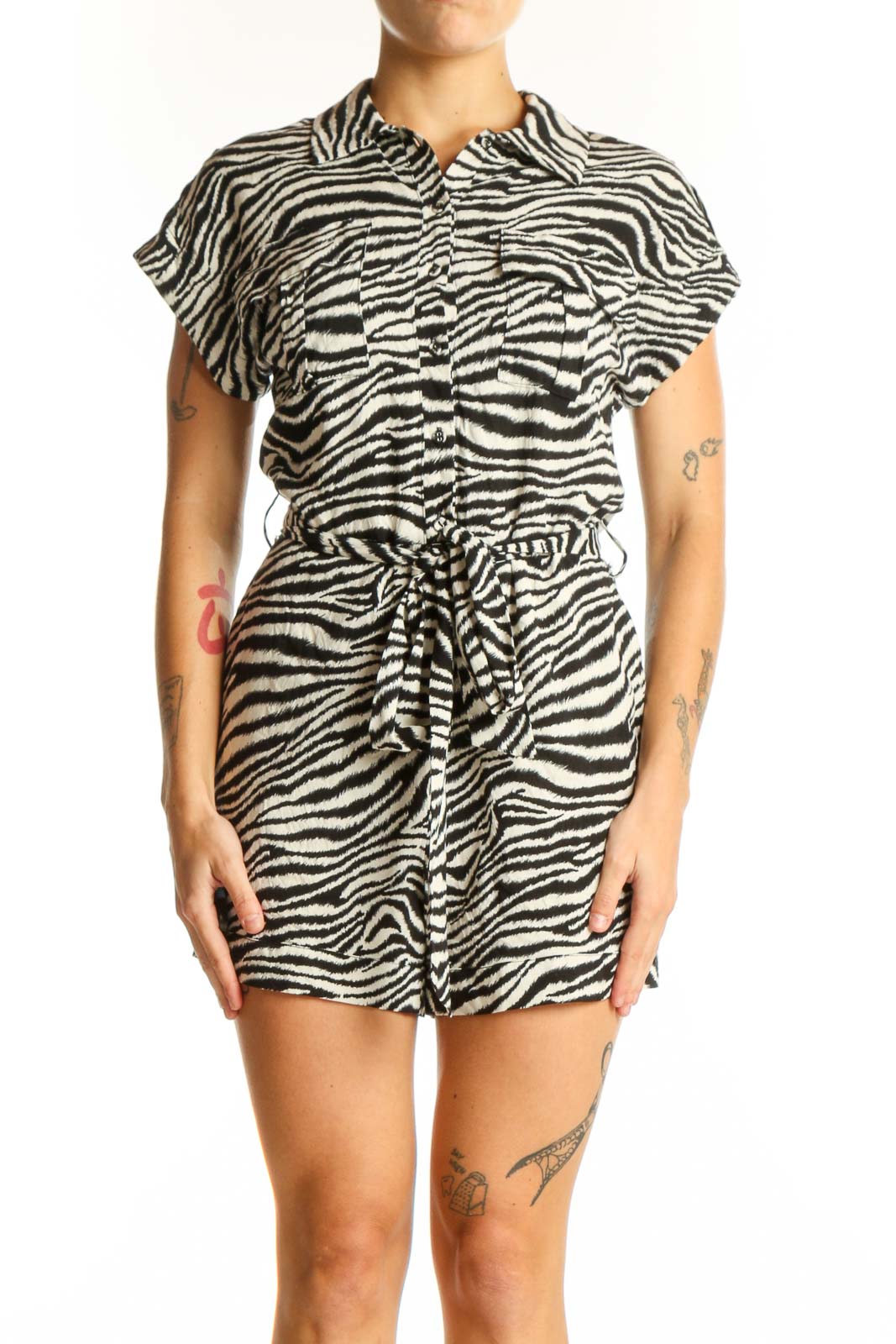 Front view of Aqua Black and White Zebra Print Romper with button-down front and drawstring waist