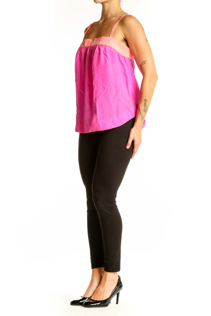 Front view of HD in Paris pink silk sleeveless blouse with two-tone design