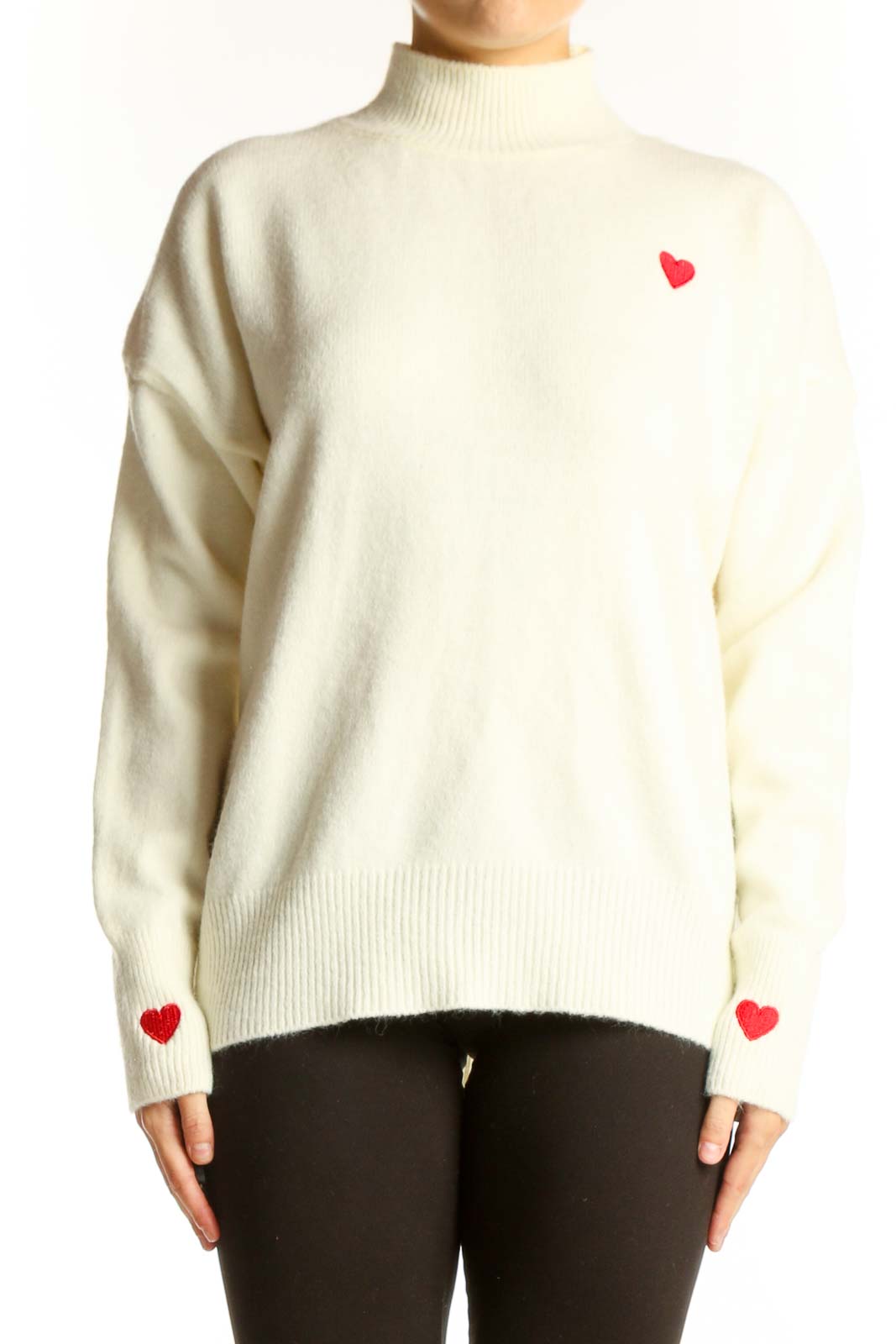 Front view of cream SilkRoll mock neck sweater with red heart on chest