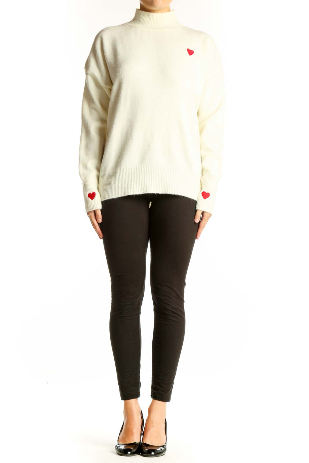Front view of cream SilkRoll mock neck sweater with red heart on chest