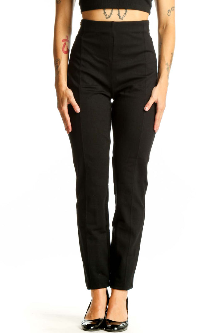 Front view of I.N.C black high-waisted slim fit pants