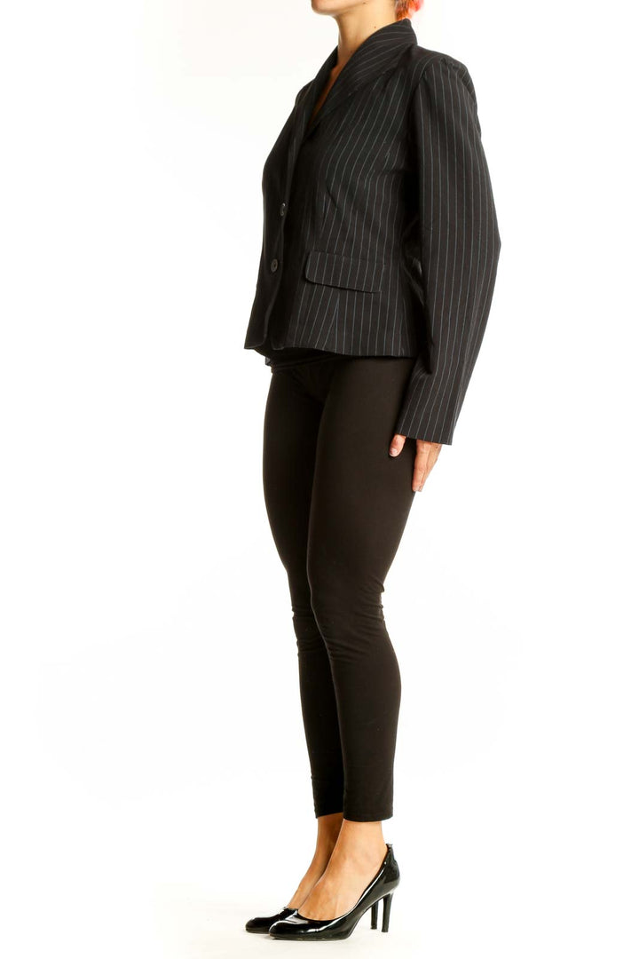 Front view of Danny & Nicole black pinstripe blazer with two-button closure