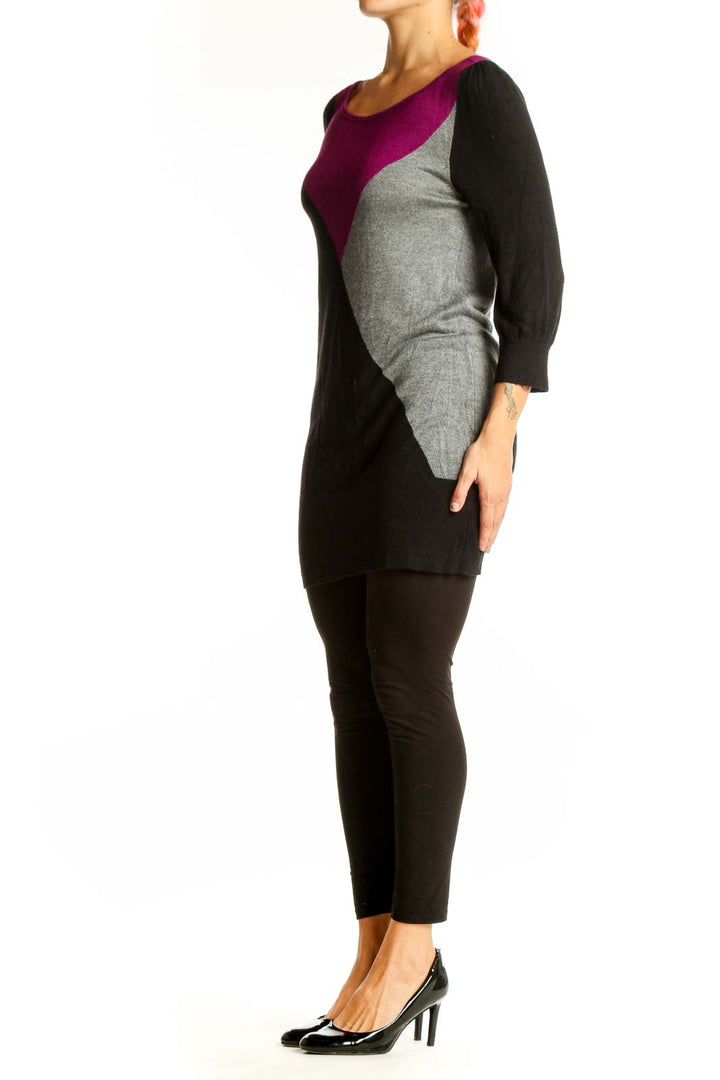 Front view of White House Black Market color block knit tunic in black, purple, and gray