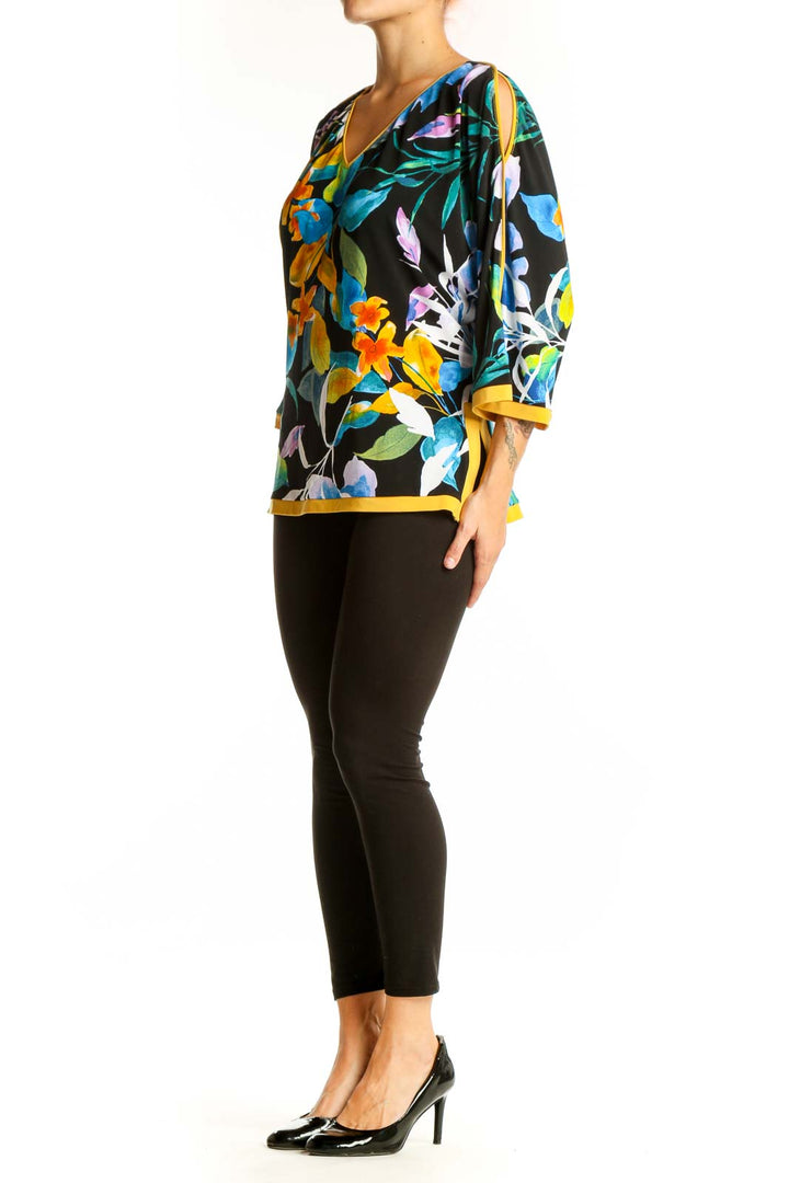 Front view of FRANK LYMAN multicolor floral V-neck blouse with 3/4 sleeves