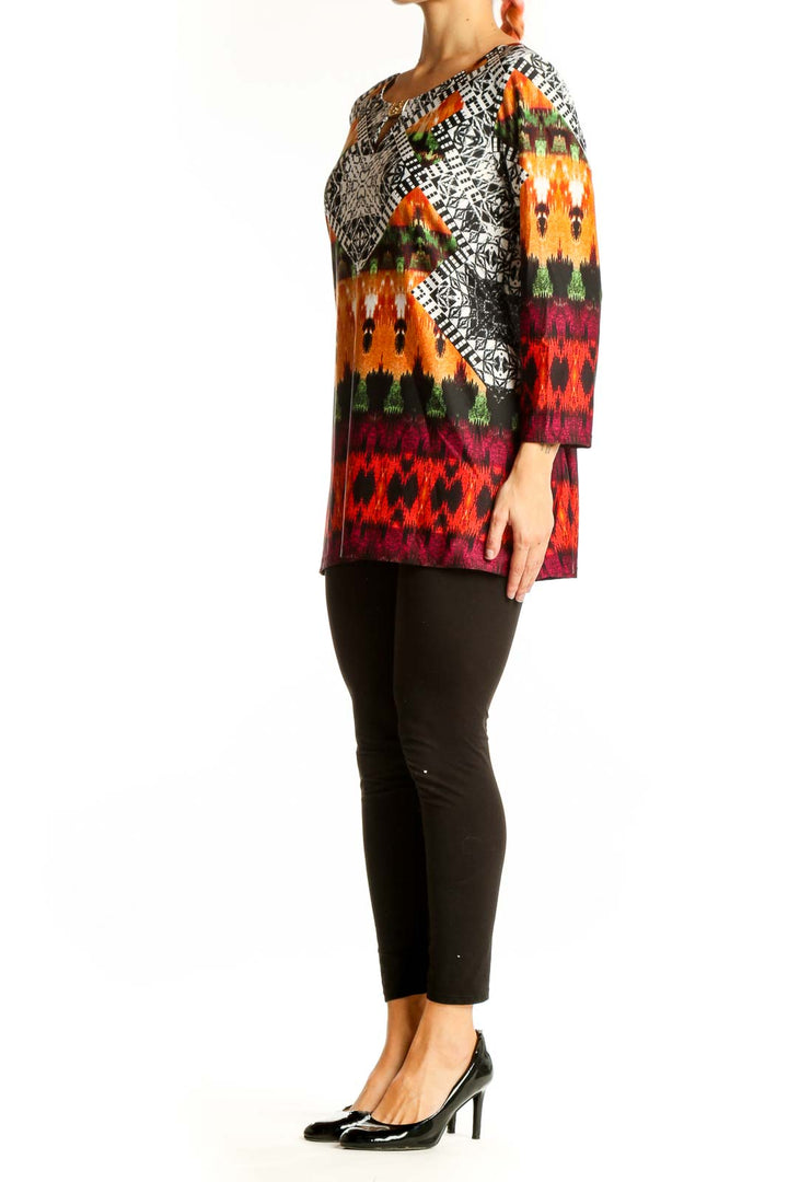 Front view of Melissa Paige multicolor geometric print tunic top with keyhole neckline