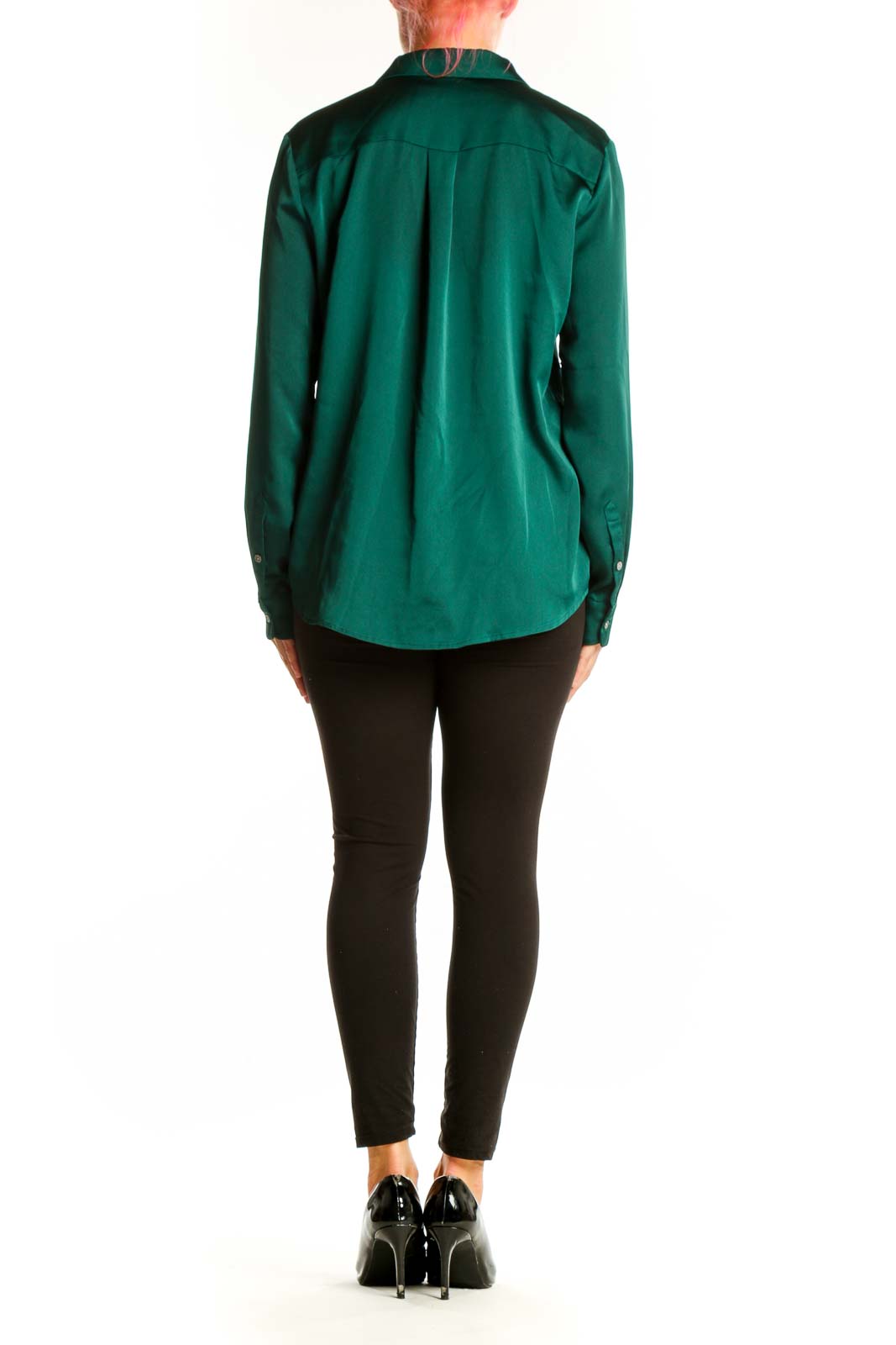 Back view of emerald green satin button-down blouse from J.Crew on model