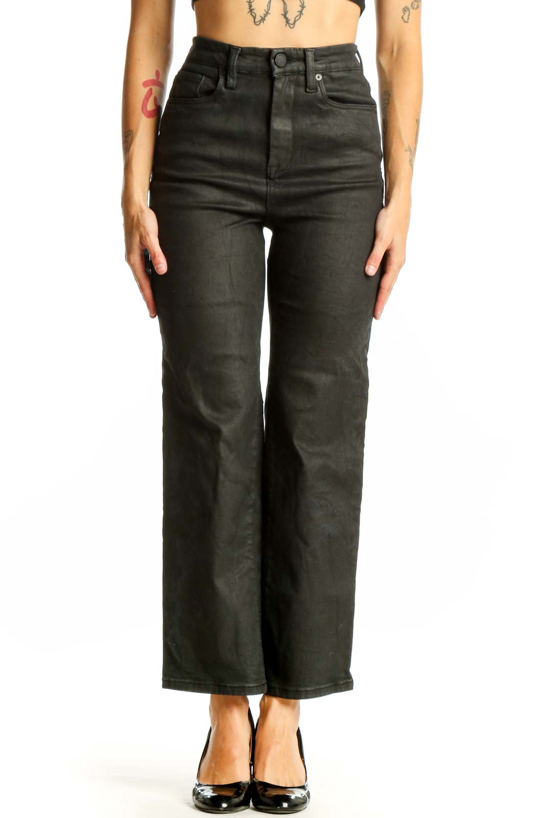 Front view of BLANKNYC black high-waisted wide-leg jeans on model