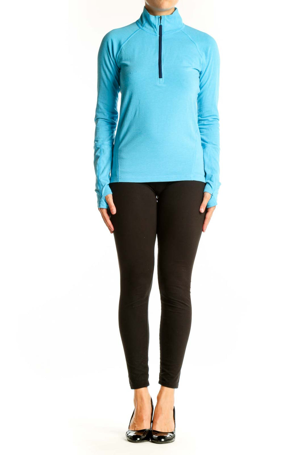 Front view of Stio turquoise half-zip athletic top