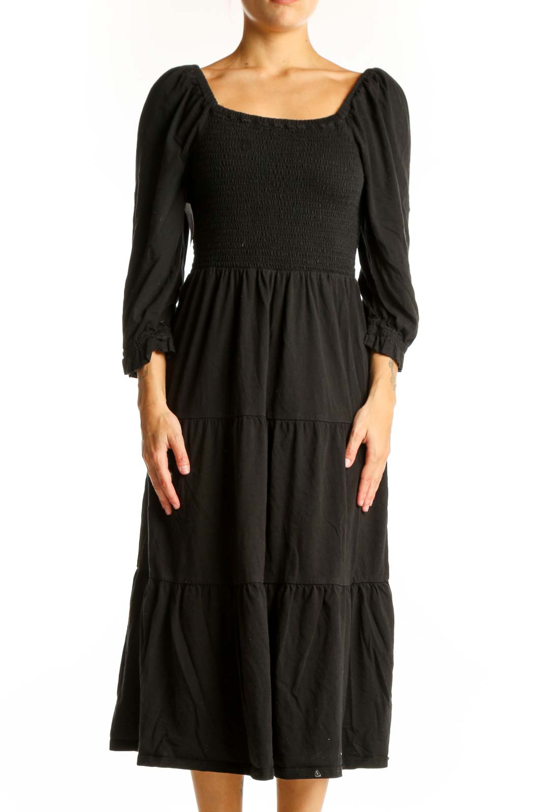 Front view of J.Crew black cotton midi dress with smocked bodice and puff sleeves