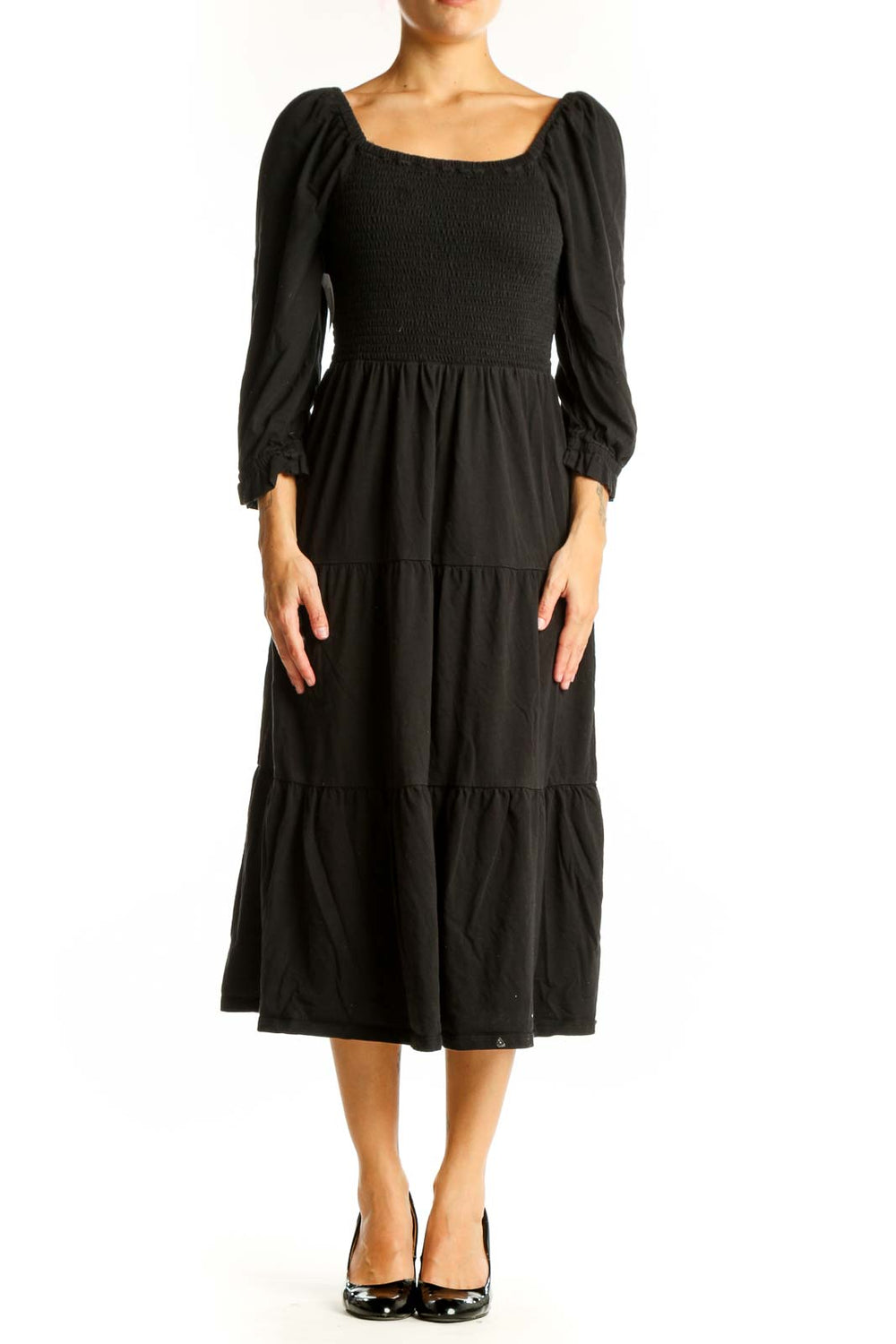 Front view of J.Crew black cotton midi dress with smocked bodice and puff sleeves