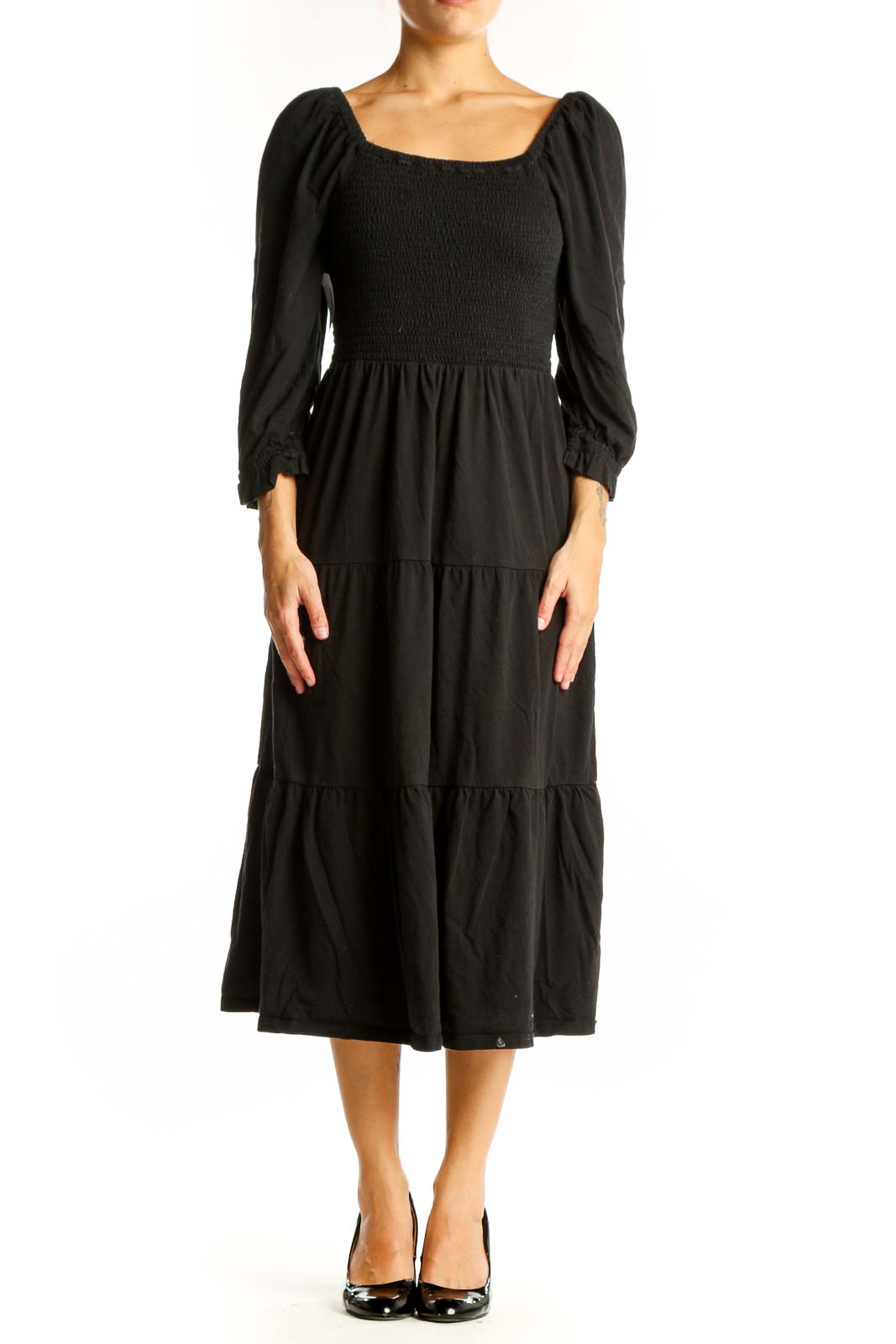 Front view of J.Crew black cotton midi dress with smocked bodice and puff sleeves