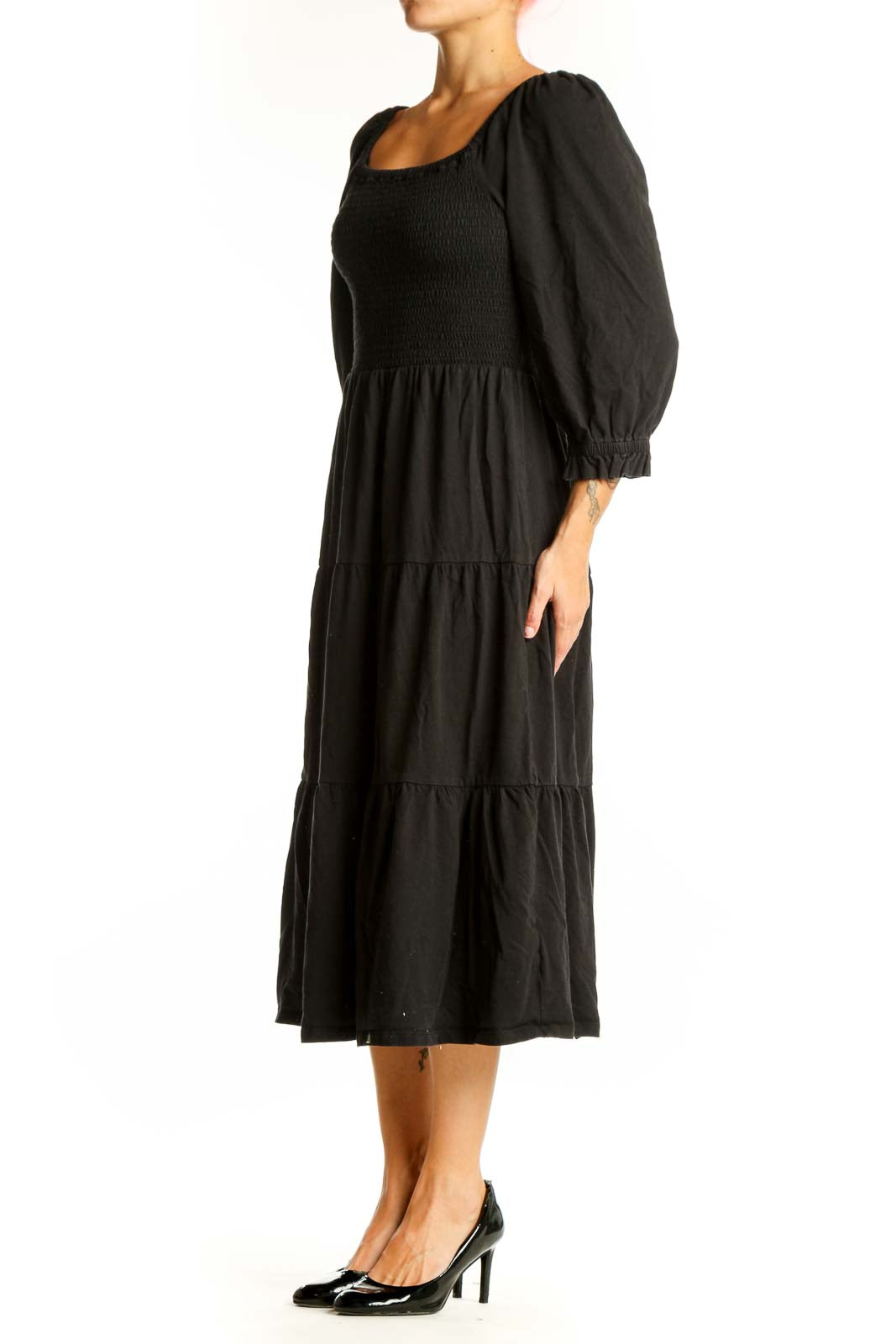 Front view of J.Crew black cotton midi dress with smocked bodice and puff sleeves