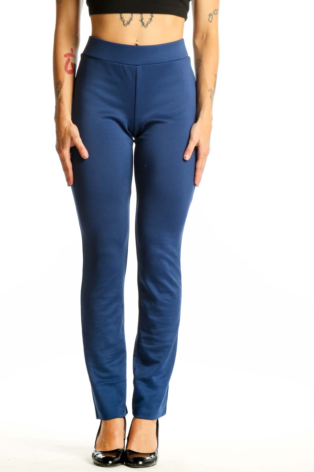 Front view of ECI navy straight-leg pants on model