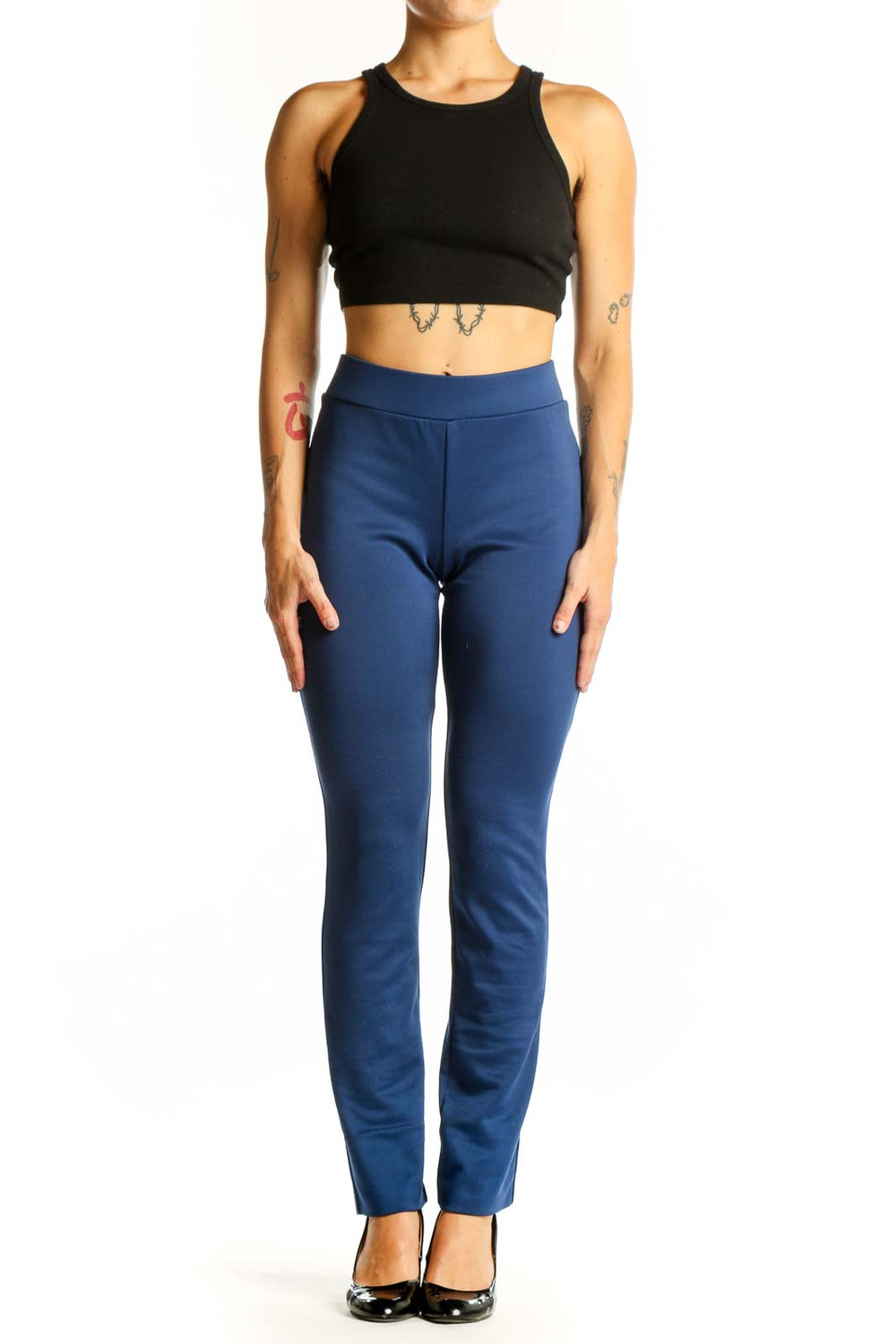 Front view of ECI navy straight-leg pants on model