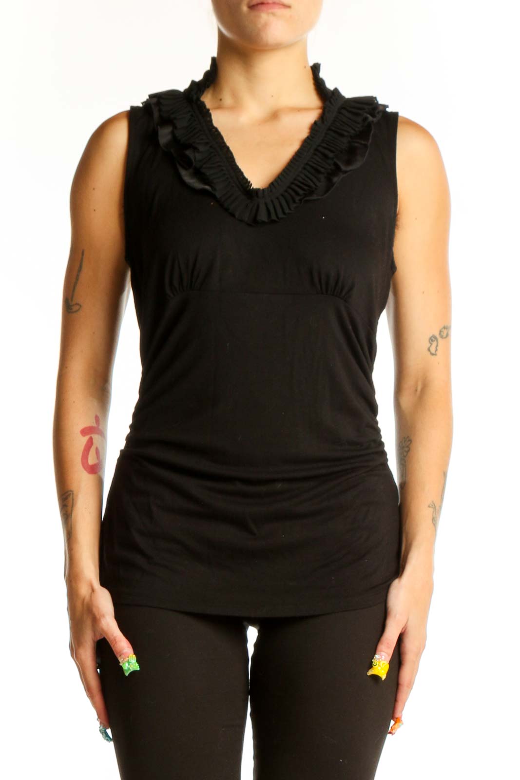 Front view of black ruffle-neck sleeveless top from White House Black Market