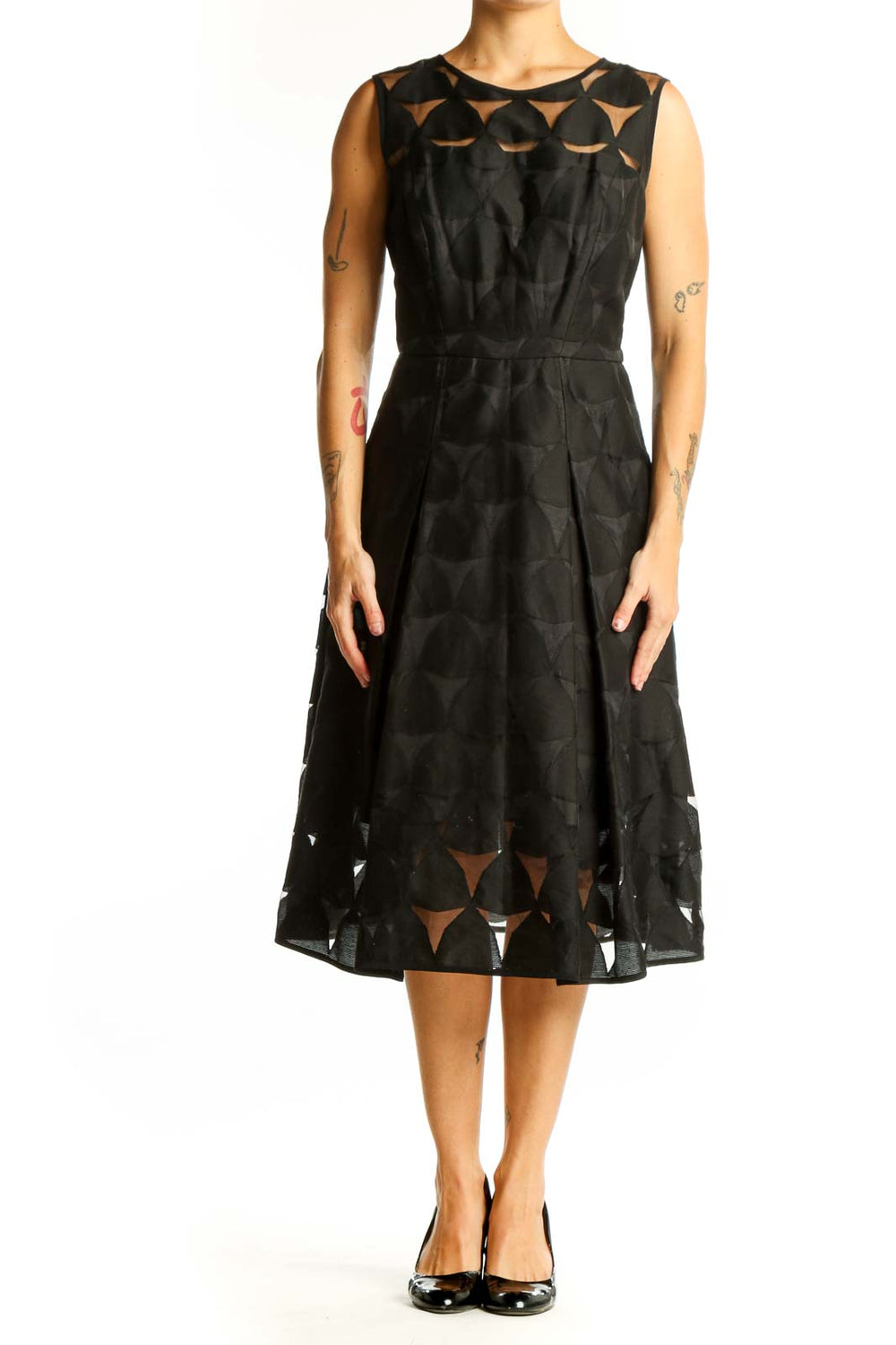 Front view of black Milly midi dress with geometric cut-out pattern