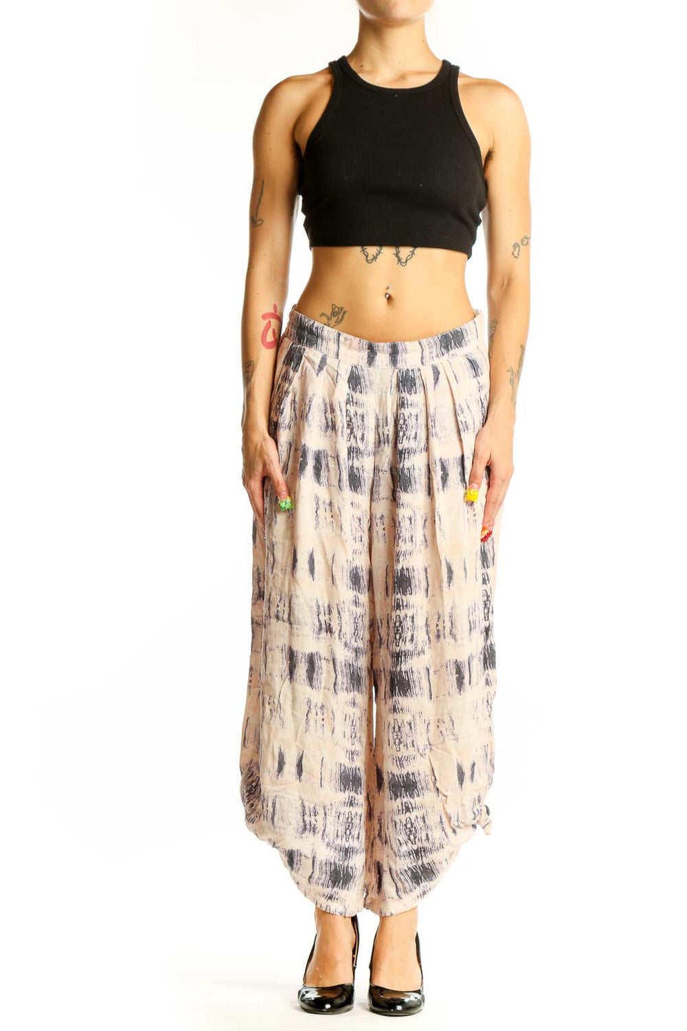 Front view of Elevenses beige tie-dye wide-leg cotton pants