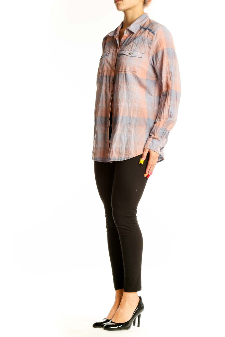 Front view of Toad&Co pink and gray plaid cotton button-up shirt with chest pockets