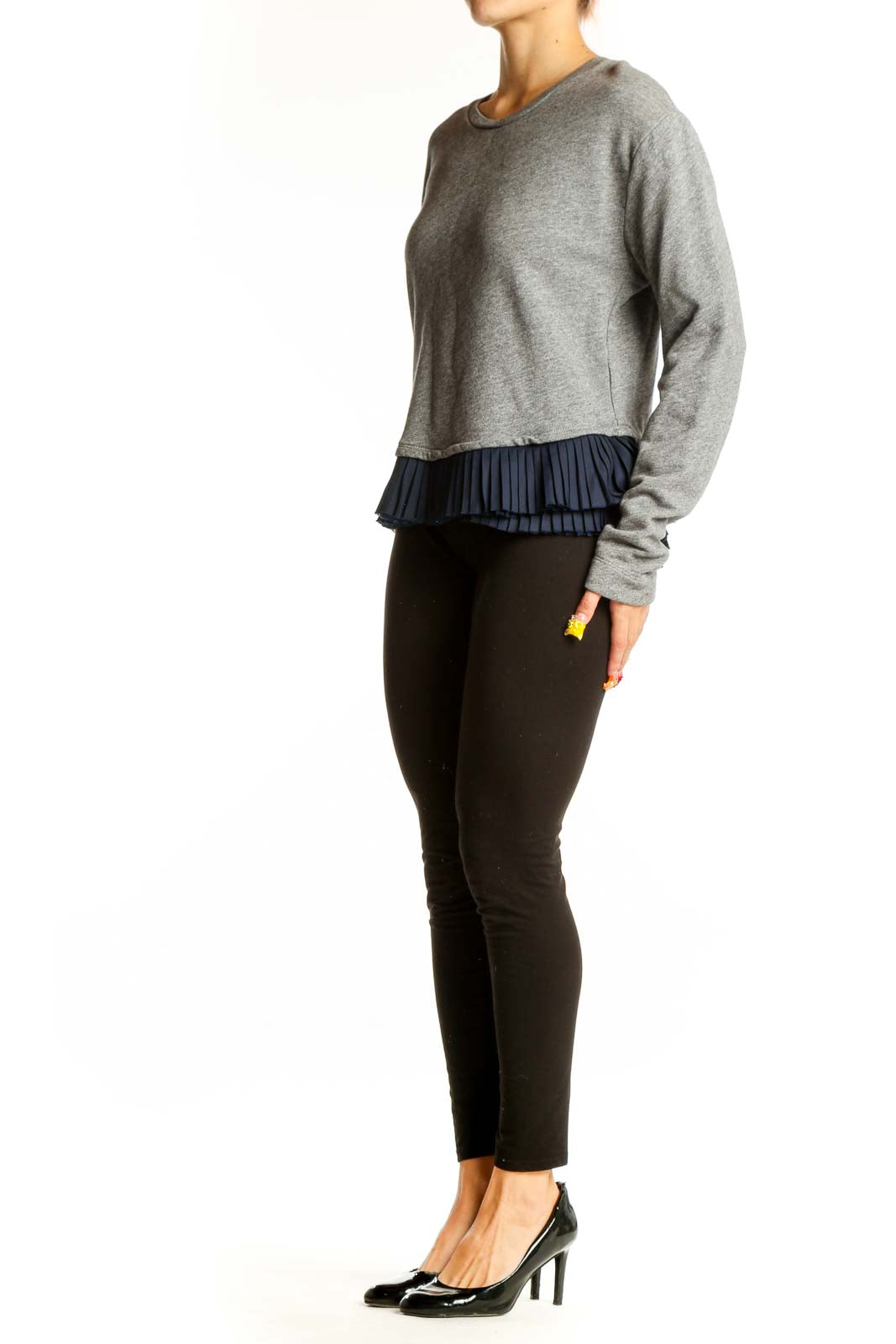 Front view of gray J.Crew sweater with navy ruffle hem