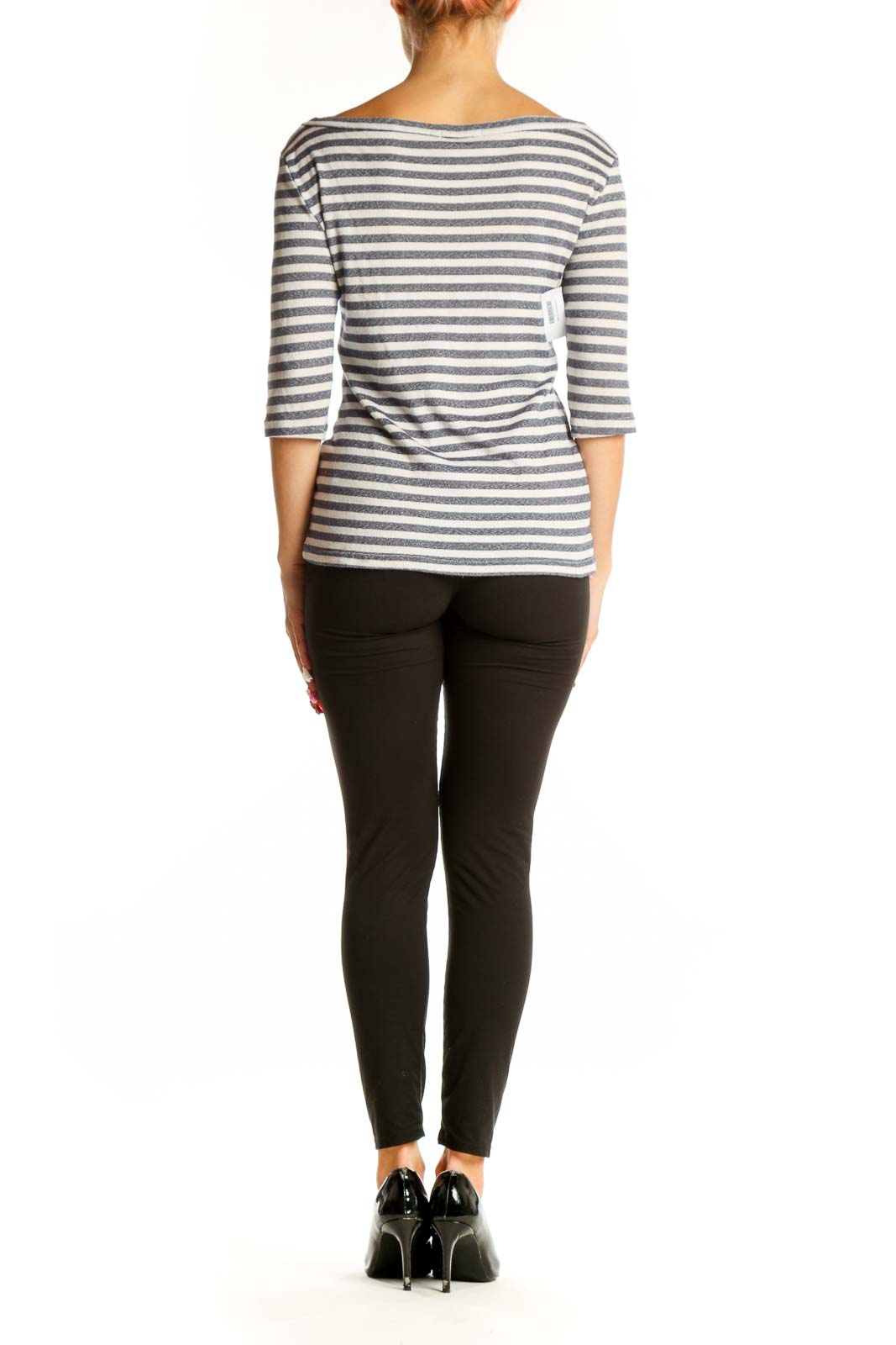 Back view of Michael Stars gray and white striped top on model with black pants