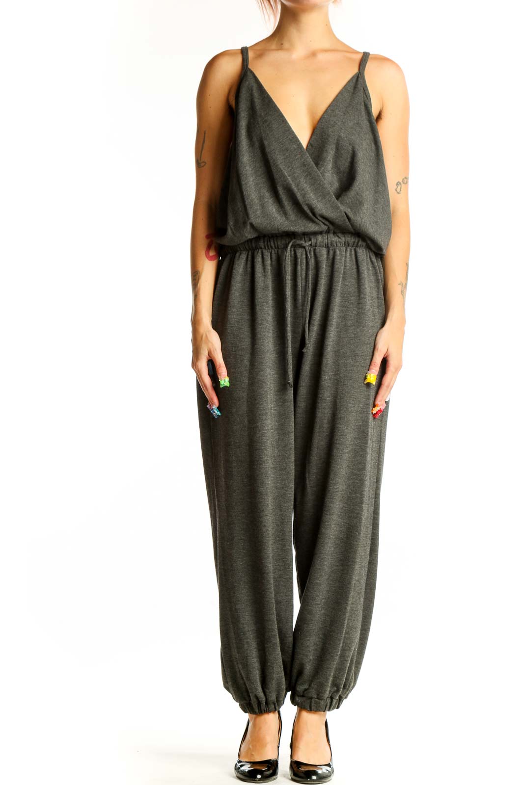 Front view of Nine Britton charcoal gray cotton jumpsuit with wrap bodice