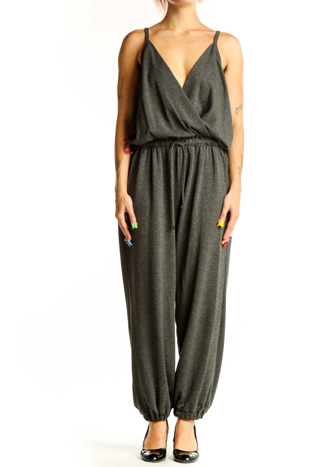 Front view of Nine Britton charcoal gray cotton jumpsuit with wrap bodice