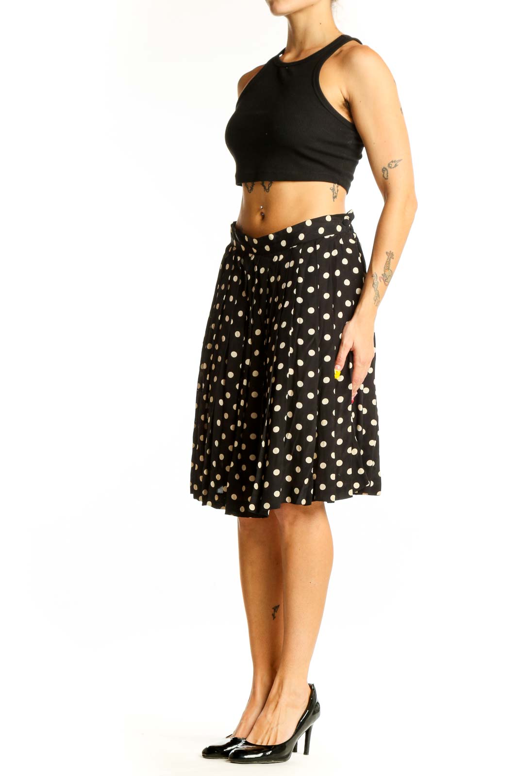 Front view of Laura Ashley black and white polka dot A-line skirt