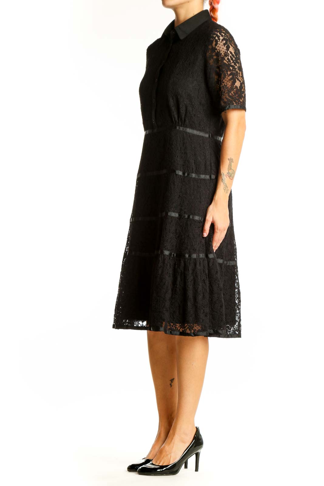 Front view of Nanette Lepore black lace shirt dress with tiered skirt