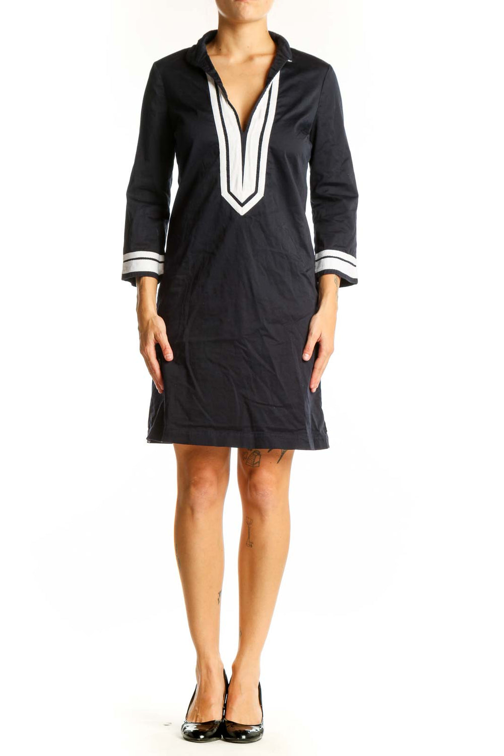 Front view of Tory Burch black tunic dress with white trim and V-neck