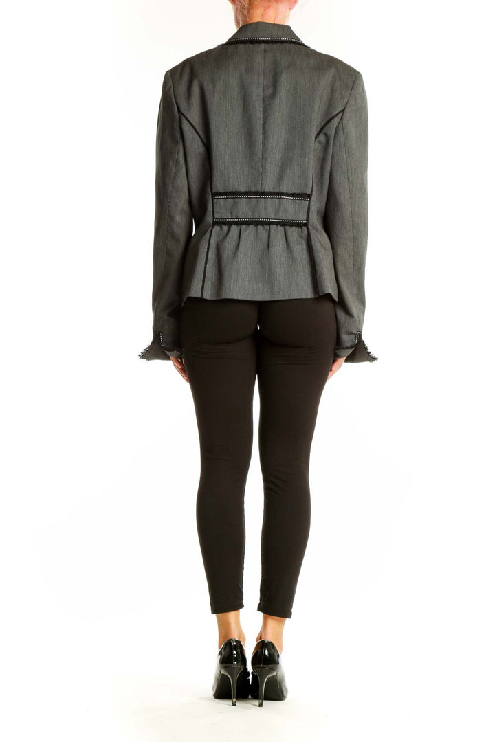 Side view of White House Black Market gray blazer showing tailored fit