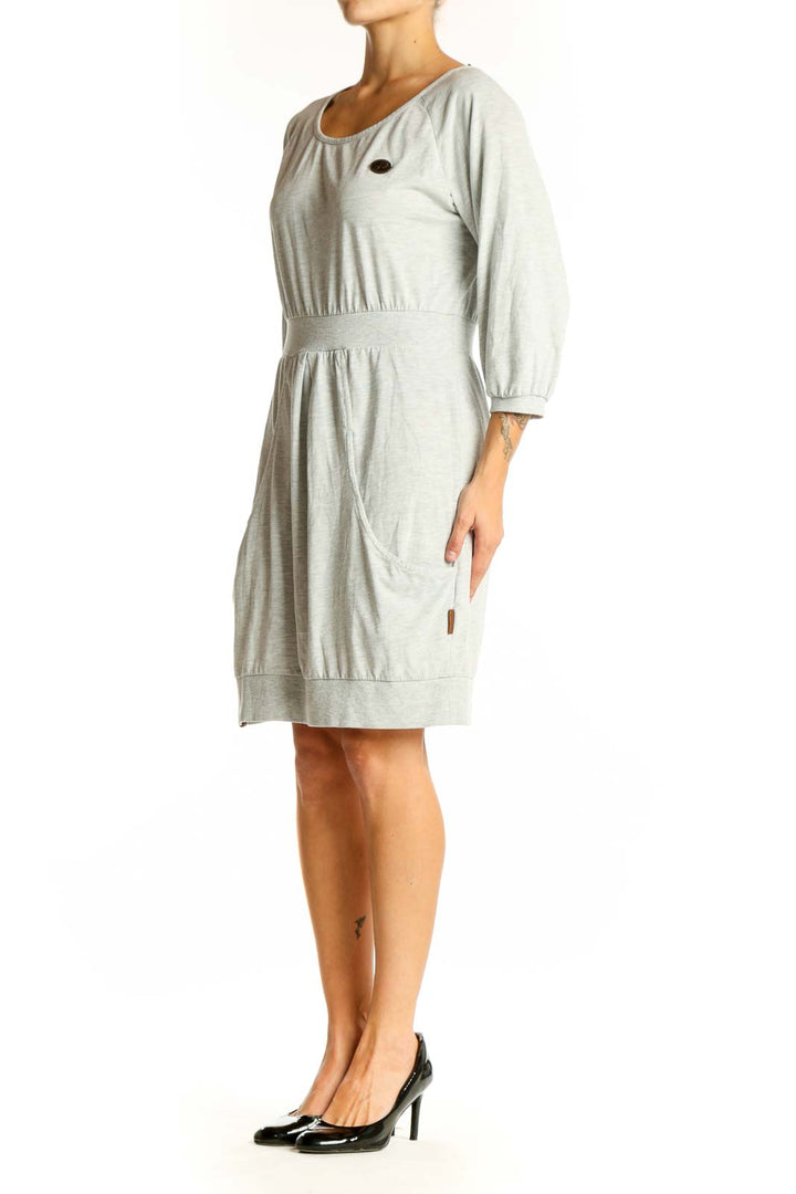 Front view of light gray Naketano casual dress with scoop neckline and 3/4 sleeves