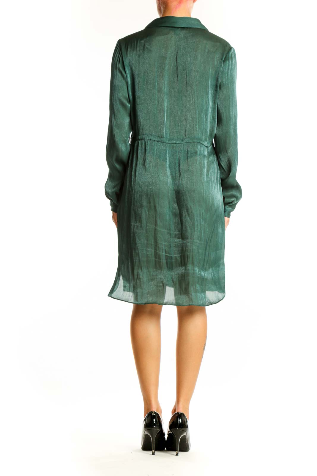 Side view of green sheer Alfani shirt dress showing flowy silhouette