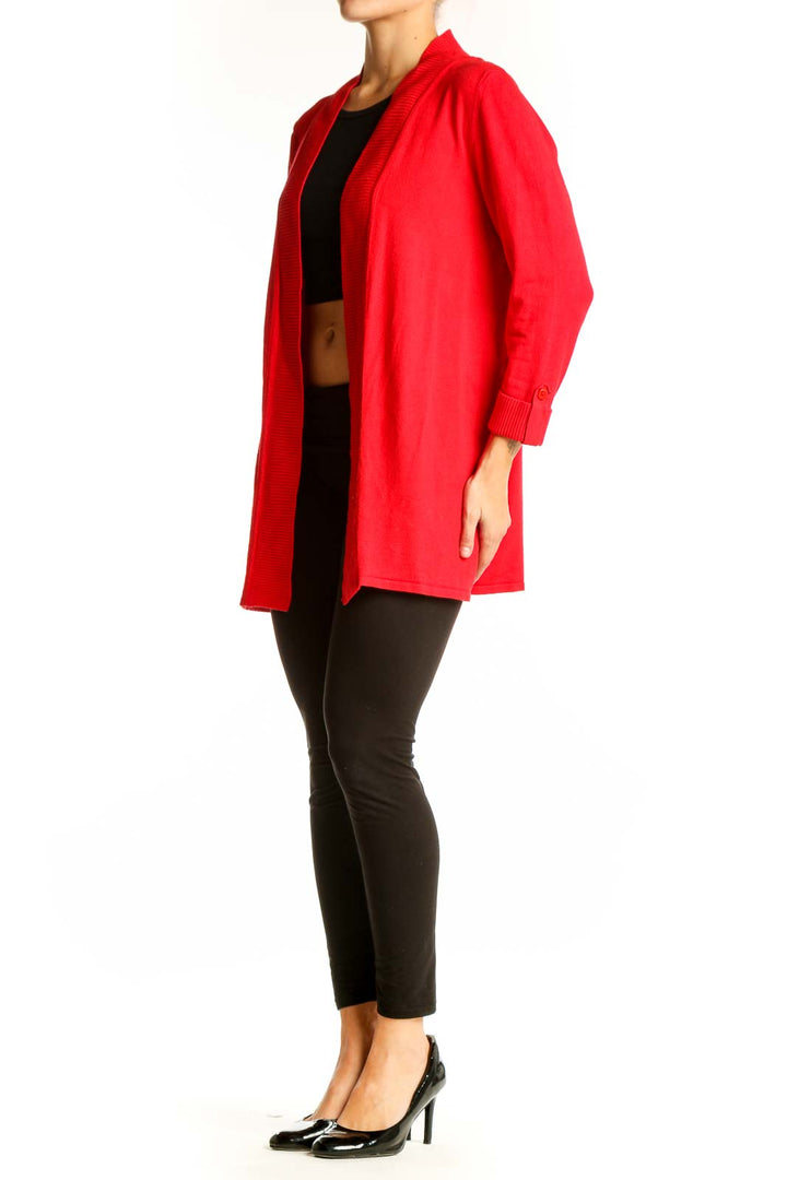 Front view of red Premise open front knit cardigan