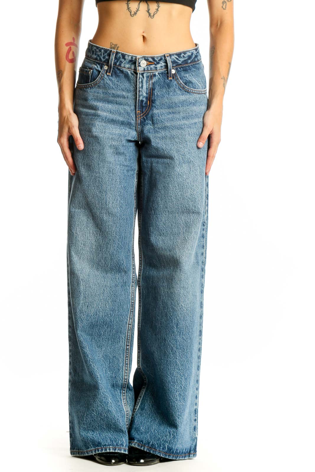Front view of blue wide-leg Levi's jeans on model