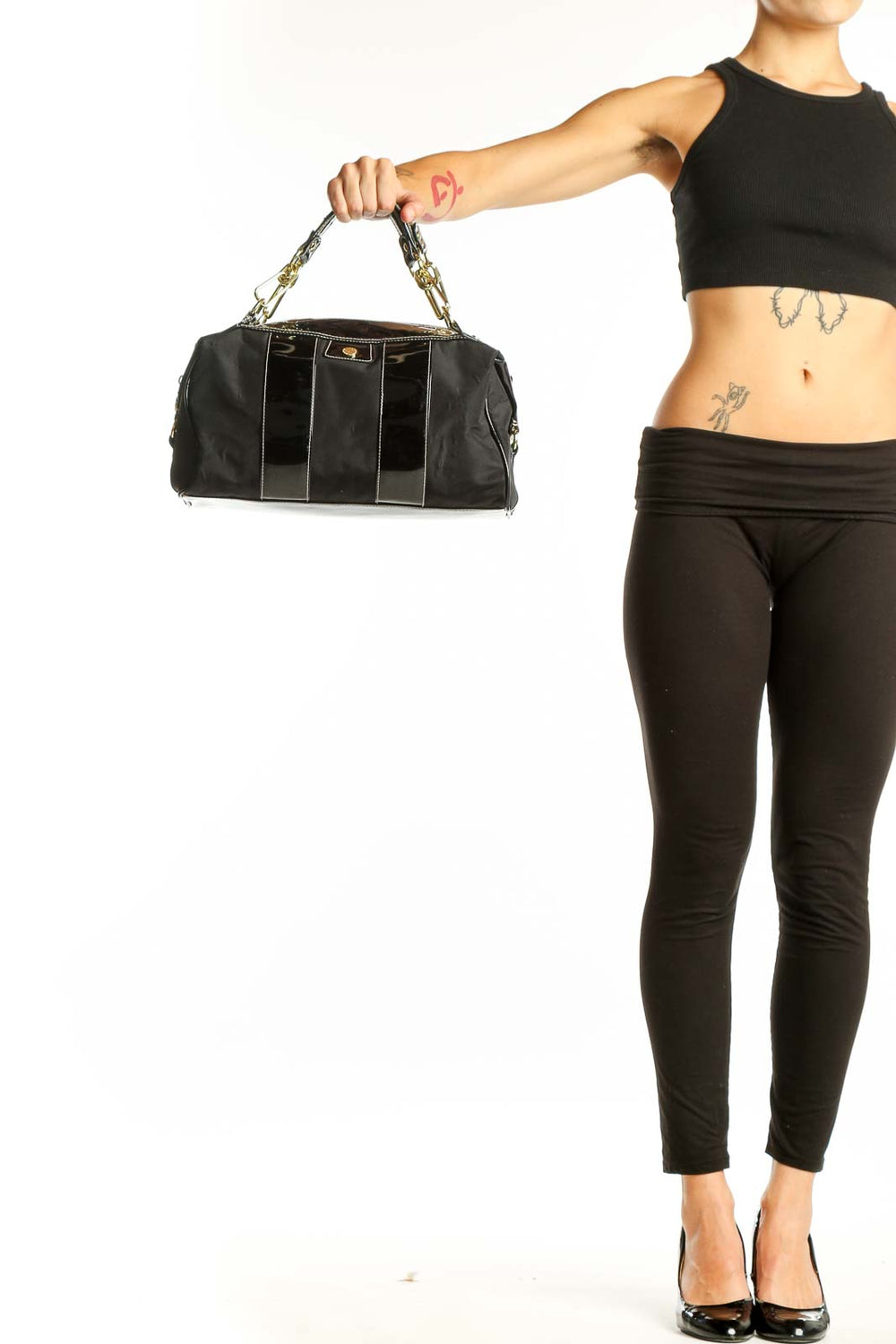 Front view of Issac Mizrahi black shoulder bag with patent leather trim