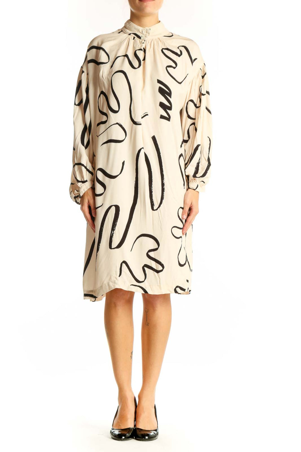 Front view of Eve Gravel beige viscose dress with black abstract pattern