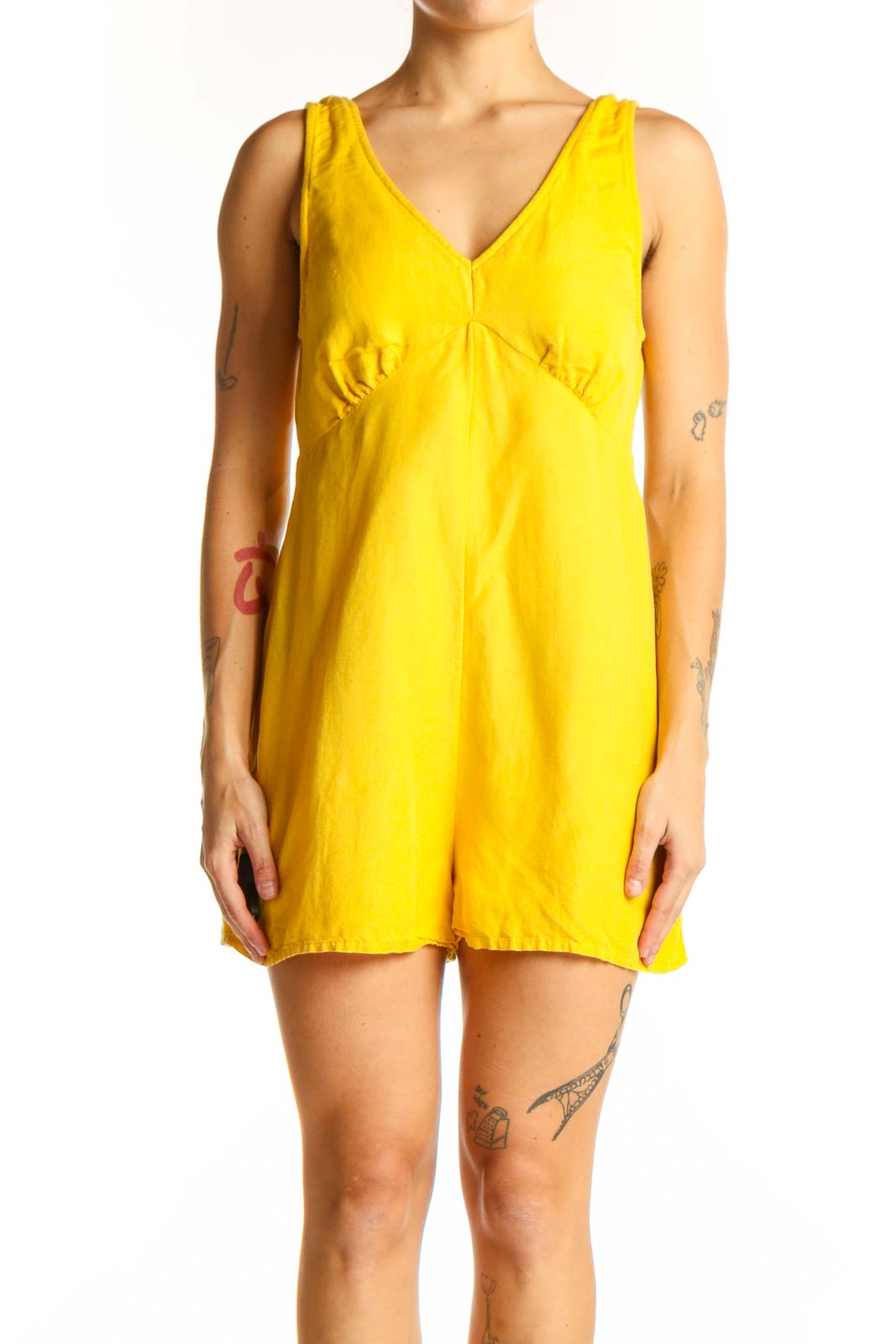 Front view of yellow RVCA V-neck sleeveless romper