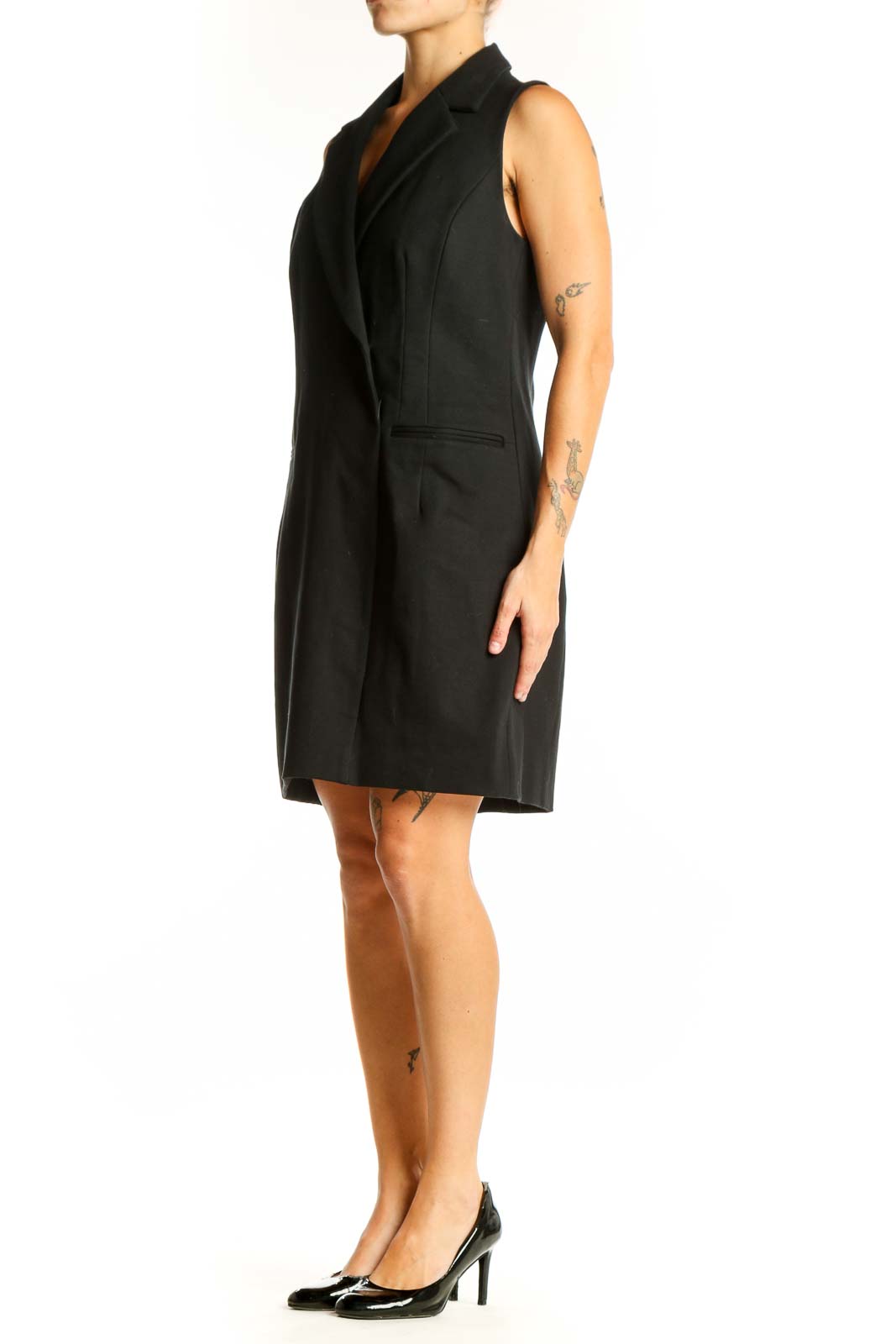 Front view of Spanx black sleeveless blazer dress