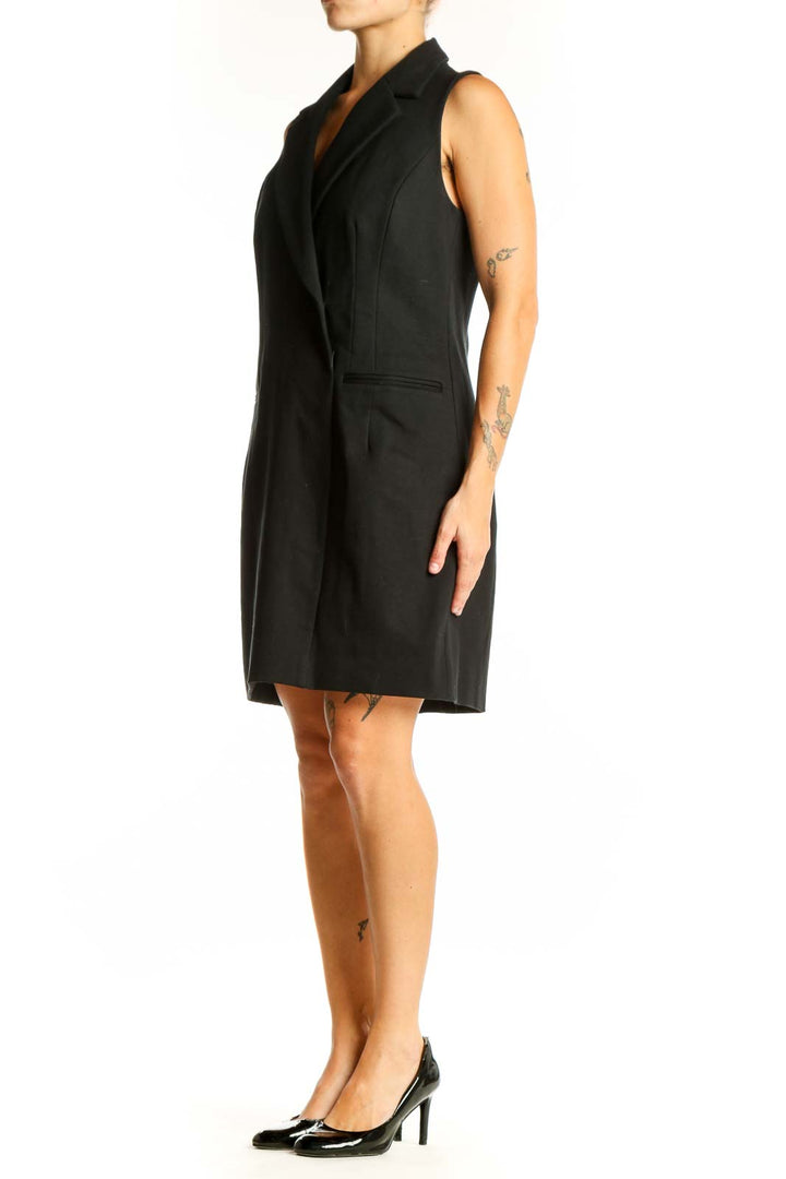 Front view of Spanx black sleeveless blazer dress