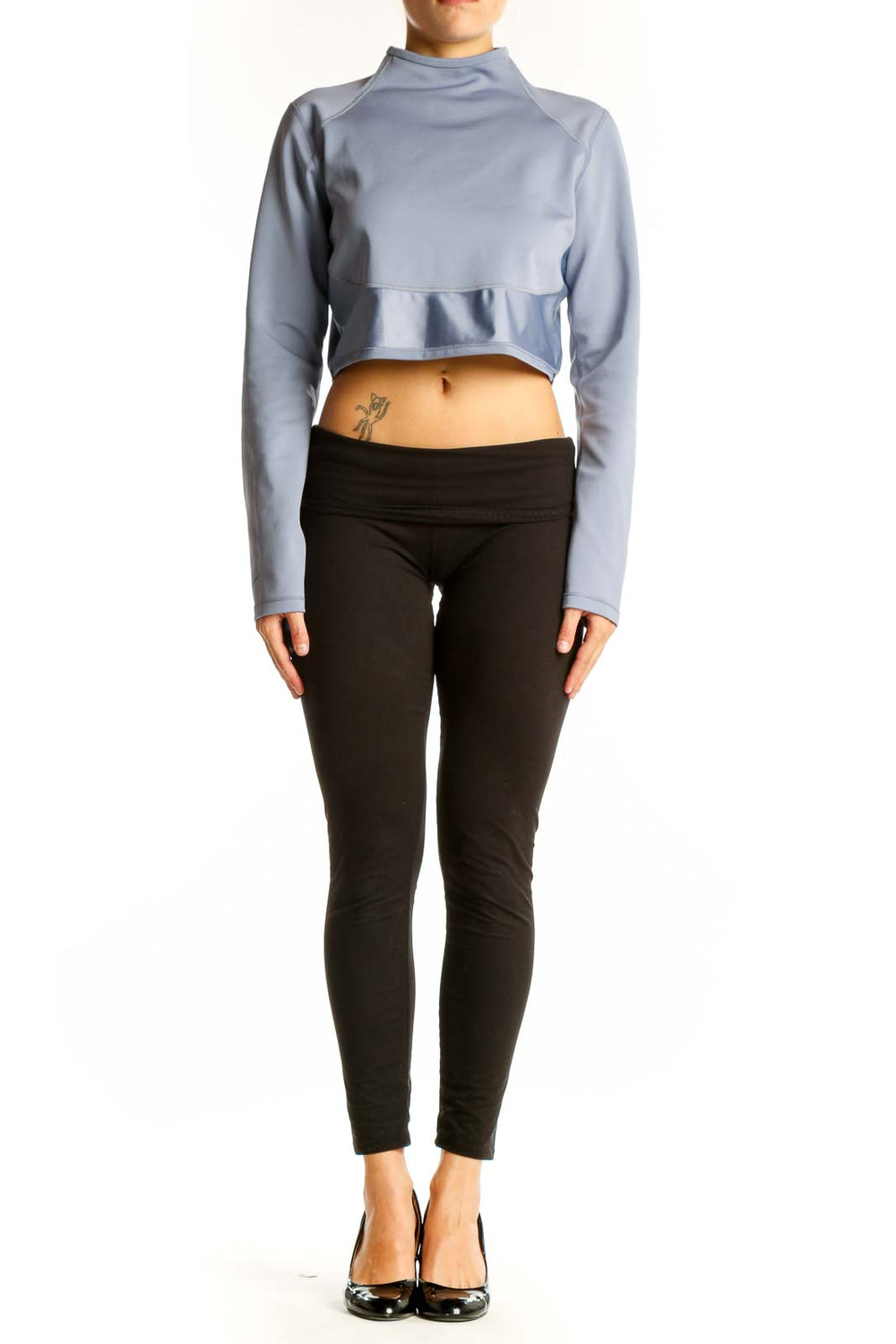 Front view of Nike Light Blue Cropped Athletic Top with high neck