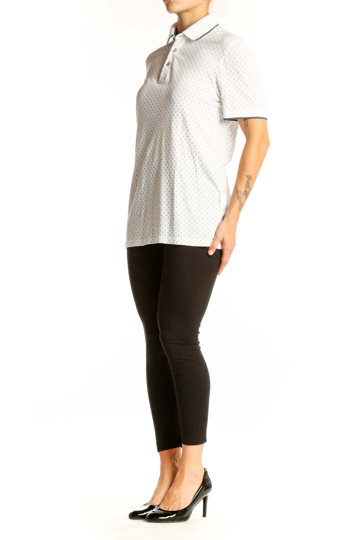 Front view of Ted Baker London white polka dot polo shirt
