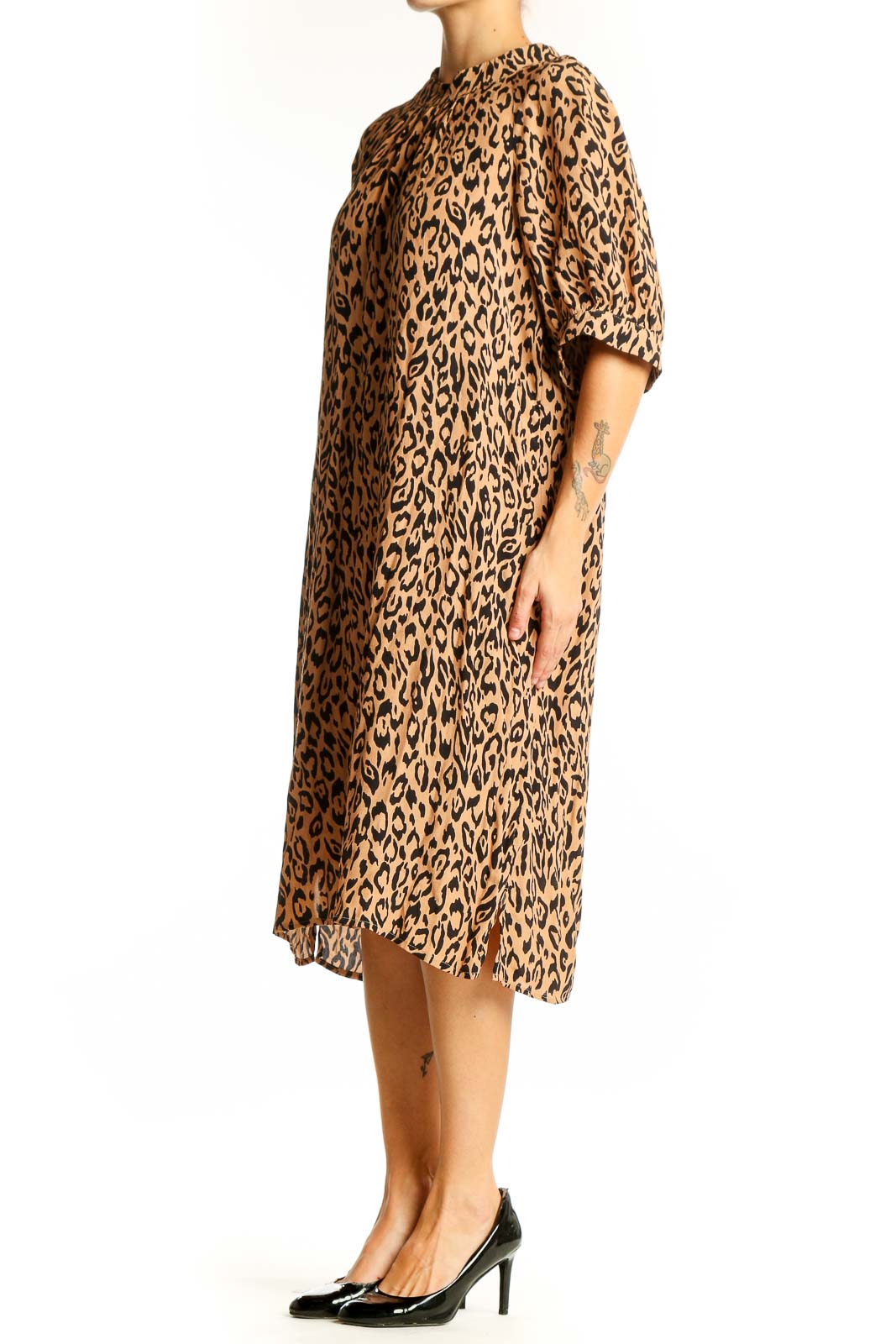 Front view of tan leopard print midi dress from Anthropologie