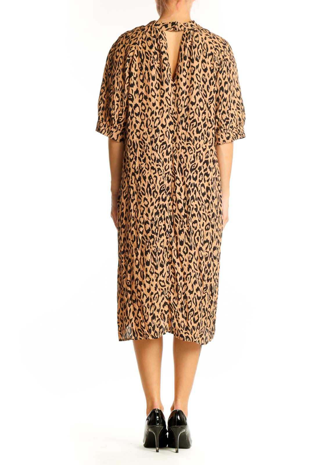Side view of tan leopard print midi dress from Anthropologie