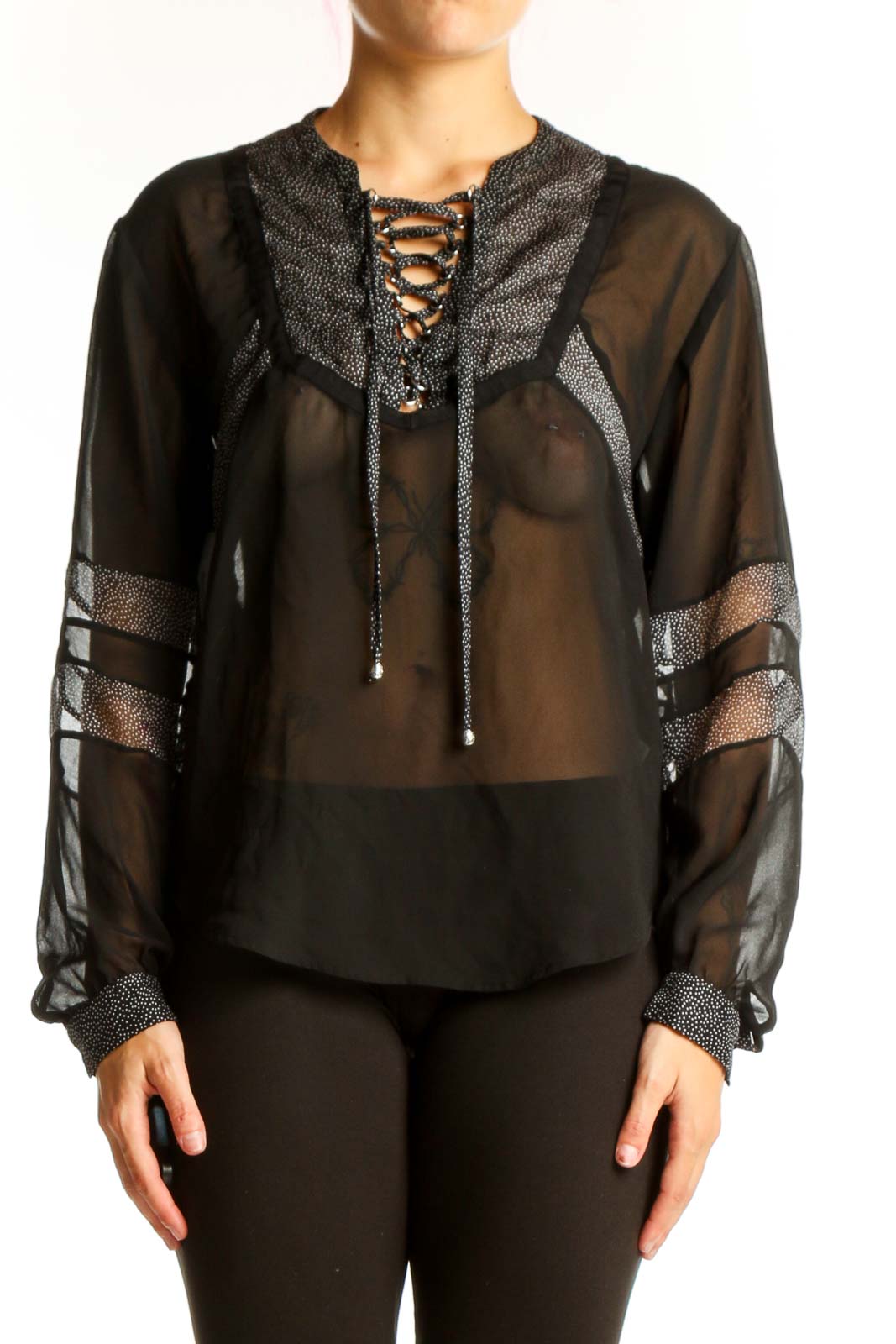 Front view of black sheer lace-up blouse by The Kooples