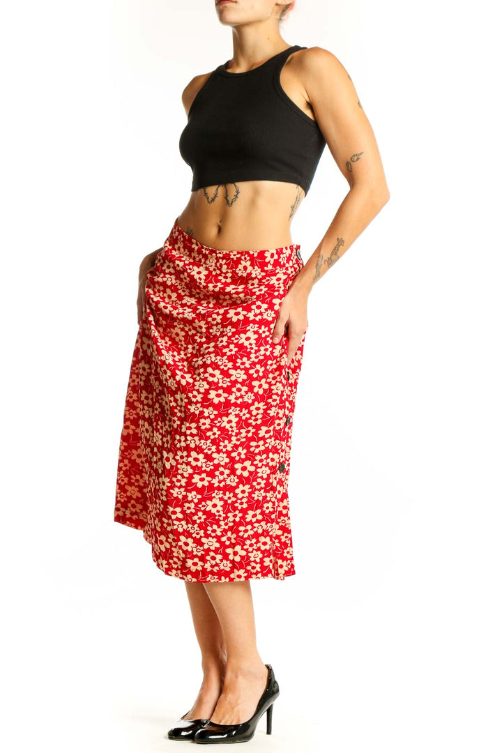 Front view of Madewell red floral midi skirt with A-line silhouette