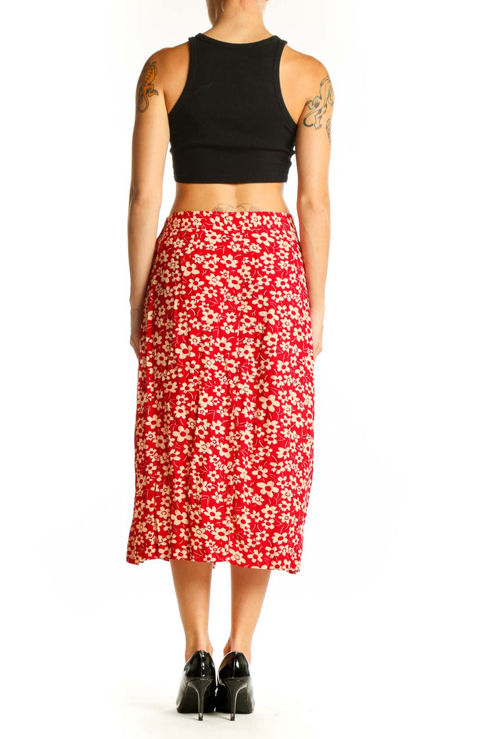 Side view of Madewell red floral midi skirt showing length and fit