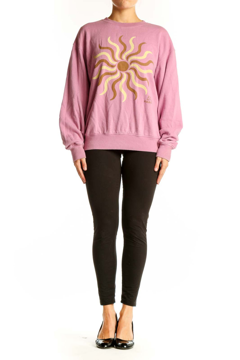 Front view of Madewell pink sweatshirt with golden sun graphic
