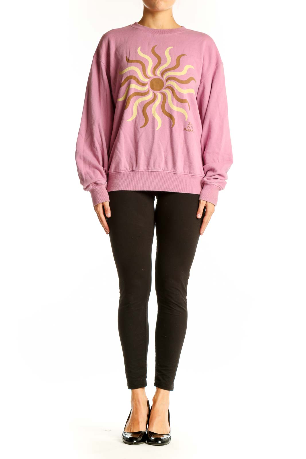 Front view of Madewell pink sweatshirt with golden sun graphic